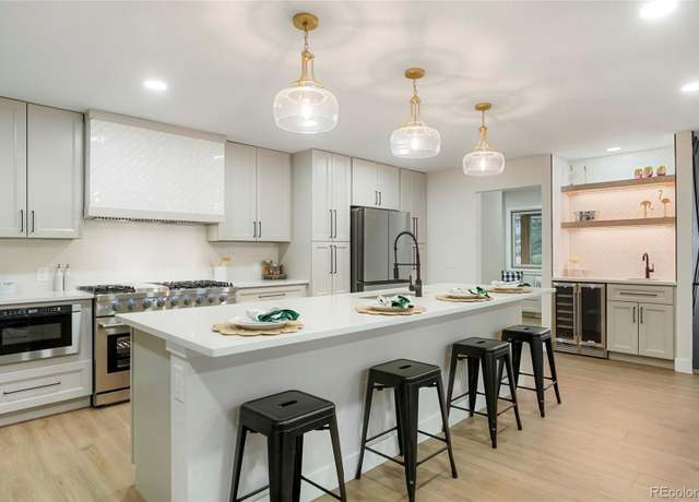 Property at 7329 S Jay St, Littleton, CO 80128, 5 beds, 4 baths