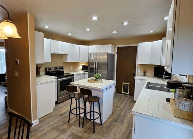 Property at 2034 S Truckee St, Aurora, CO 80013, 4 beds, 2 baths