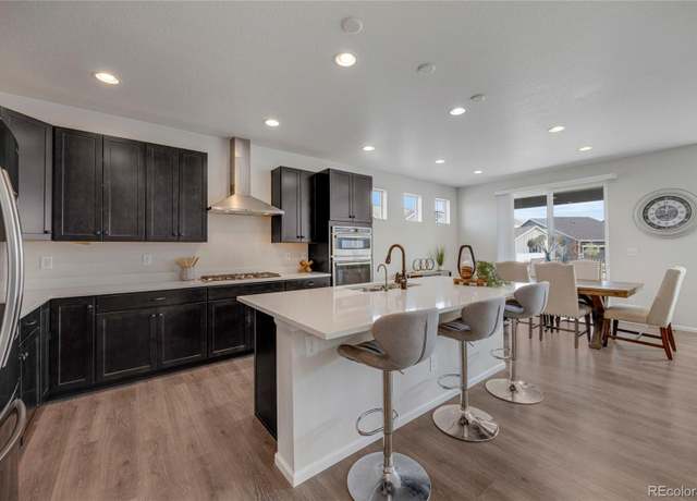 Property at 6802 S Uriah St, Aurora, CO 80016, 4 beds, 3 baths