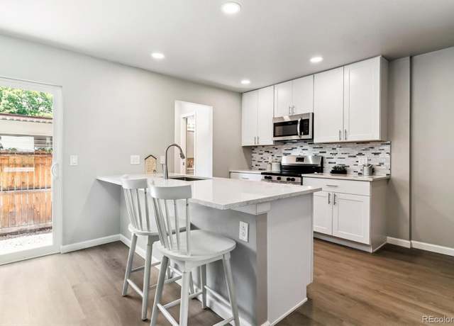 Property at 1927 S Peoria St, Aurora, CO 80014, 3 beds, 3 baths