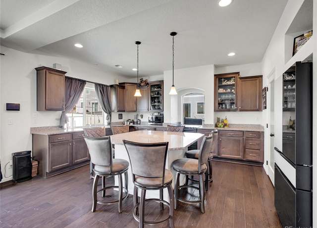 Property at 19155 Robins Dr, Denver, CO 80249, 5 beds, 3 baths