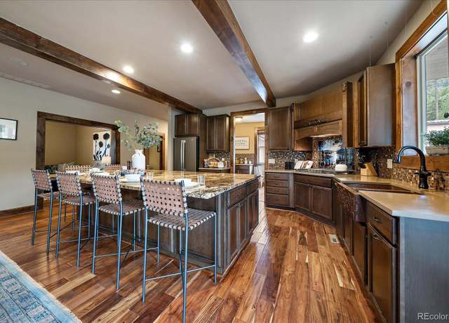 Property at 8090 S Homesteader Dr, Morrison, CO 80465, 5 beds, 5 baths