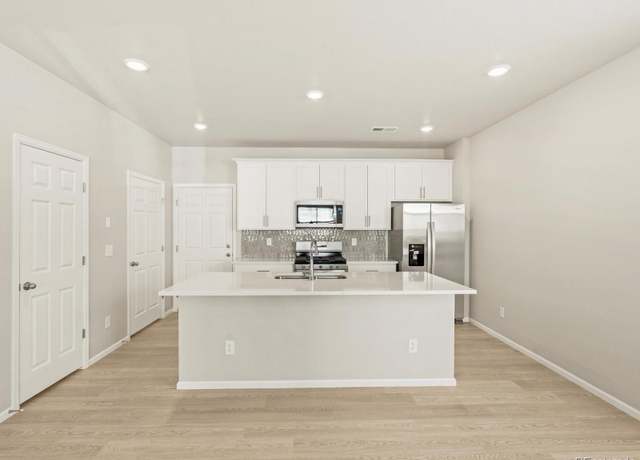 Property at 20982 E 66th Ave, Aurora, CO 80019, 3 beds, 3 baths