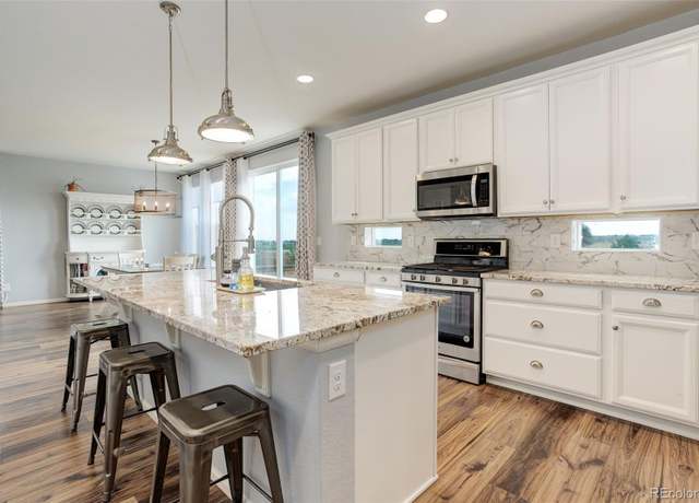 Property at 11038 Unity Ln, Commerce City, CO 80022, 5 beds, 4 baths
