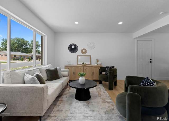 Property at 3036 S Wolff St, Denver, CO 80236, 5 beds, 3 baths