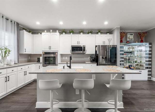 Property at 3818 S Dallas St, Aurora, CO 80014, 4 beds, 4 baths