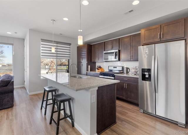 Property at 5110 E 64th Ave, Commerce City, CO 80022, 5 beds, 3 baths