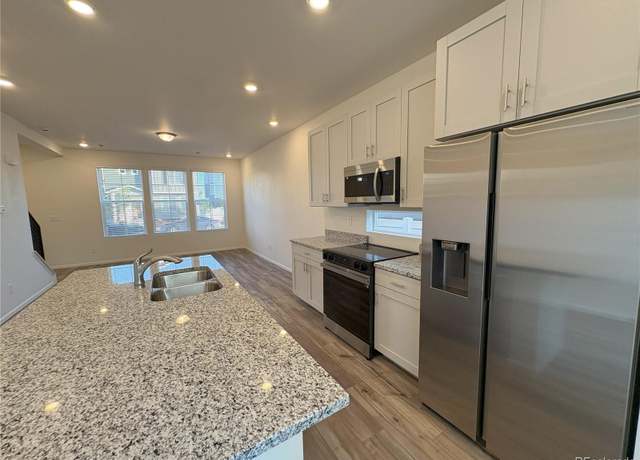 Property at 22023 E 38th Pl, Aurora, CO 80019, 4 beds, 4 baths
