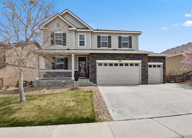 Property at 4830 S Versailles St, Aurora, CO 80015, 6 beds, 5 baths