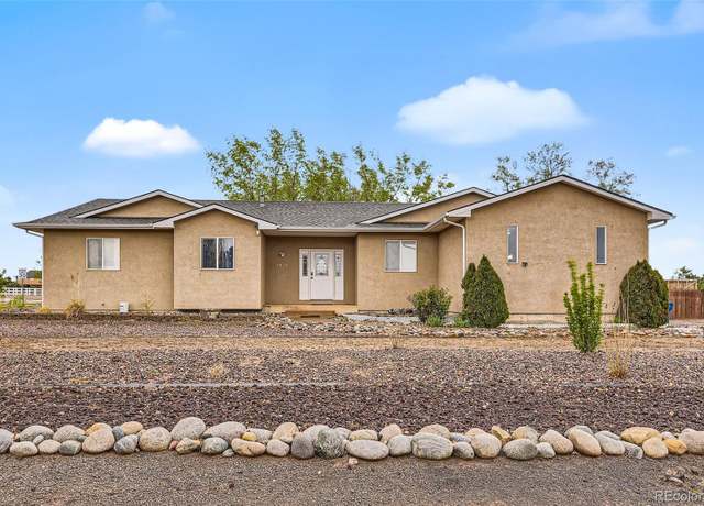 Property at 1015 W Stallion Dr, Pueblo West, CO 81007, 4 beds, 3 baths
