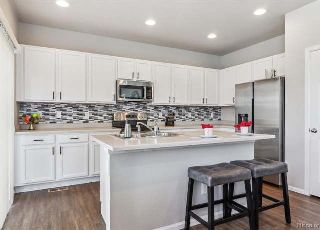 Property at 6491 N Danube St, Denver, CO 80249, 3 beds, 3 baths