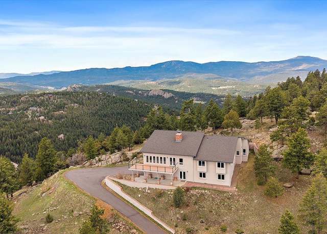 Property at 5197 Bear Mountain Dr, Evergreen, CO 80439, 6 beds, 4 baths