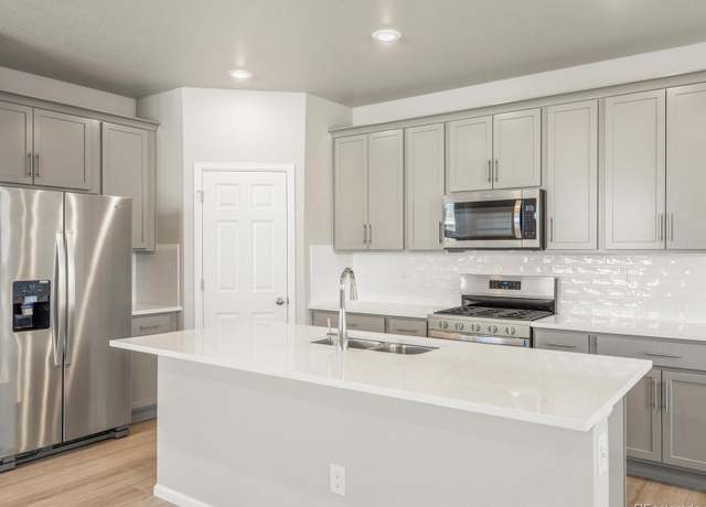 Property at 22485 E 7th Pl, Aurora, CO 80018, 3 beds, 3 baths
