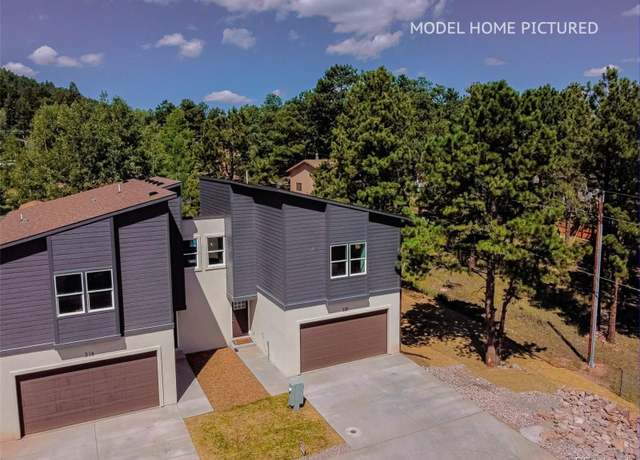 Property at 311 Spruce Mdw, Woodland Park, CO 80863, 4 beds, 3 baths