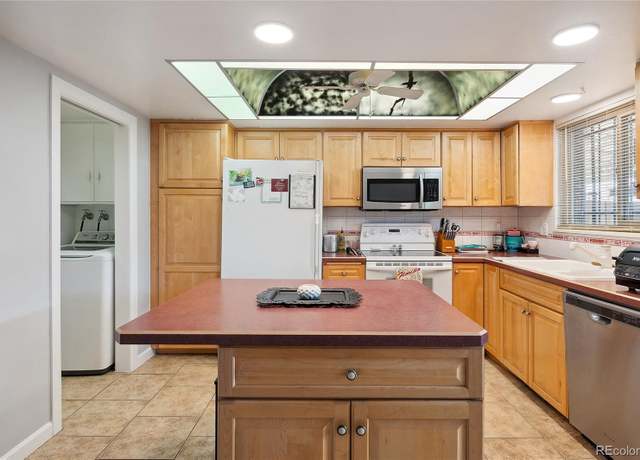 Property at 9019 E Oxford Dr, Denver, CO 80237, 3 beds, 2 baths