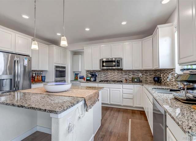 Property at 8255 S Vandriver Way, Aurora, CO 80016, 4 beds, 4 baths