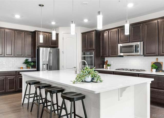 Property at 8814 S Winnipeg Ct, Aurora, CO 80016, 3 beds, 3 baths
