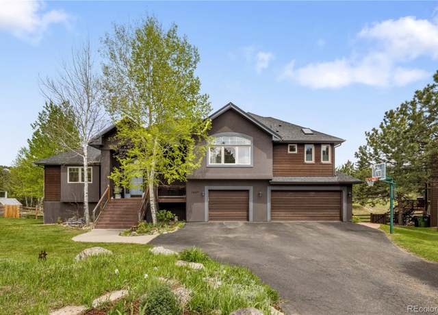 Property at 1654 Muirfield Ln, Evergreen, CO 80439, 5 beds, 3 baths