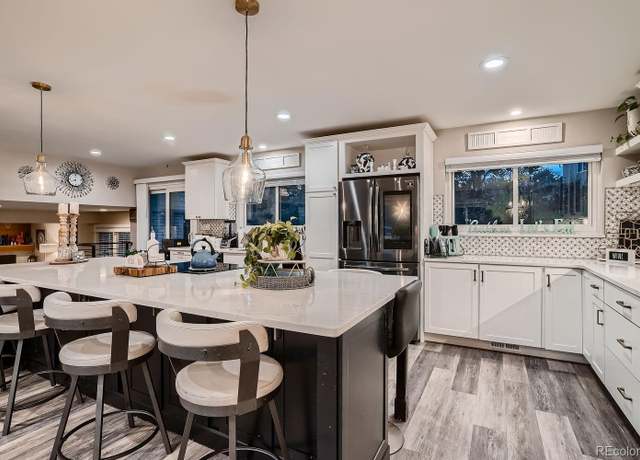 Property at 5611 W Bates Ave, Denver, CO 80227, 4 beds, 3 baths