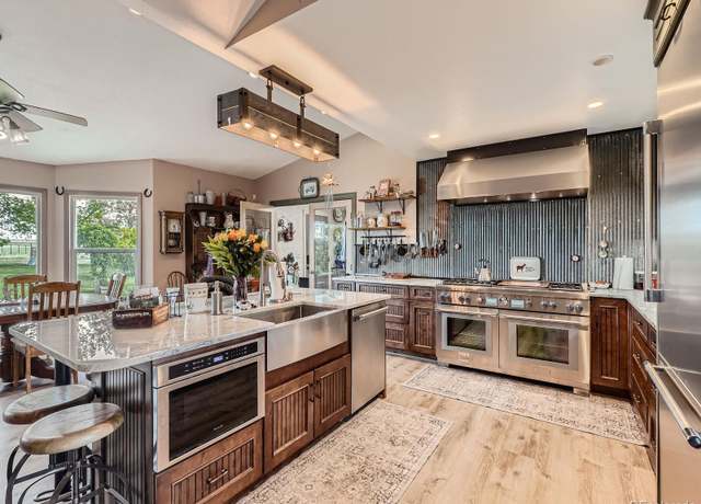 Property at 50950 E 32nd Ave, Bennett, CO 80102, 4 beds, 3 baths