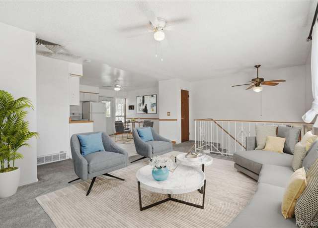 Property at 12065 E Kentucky Ave, Aurora, CO 80012, 3 beds, 2 baths