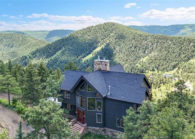 Property at 14980 Elk Mountain Trl, Littleton, CO 80127, 4 beds, 5 baths