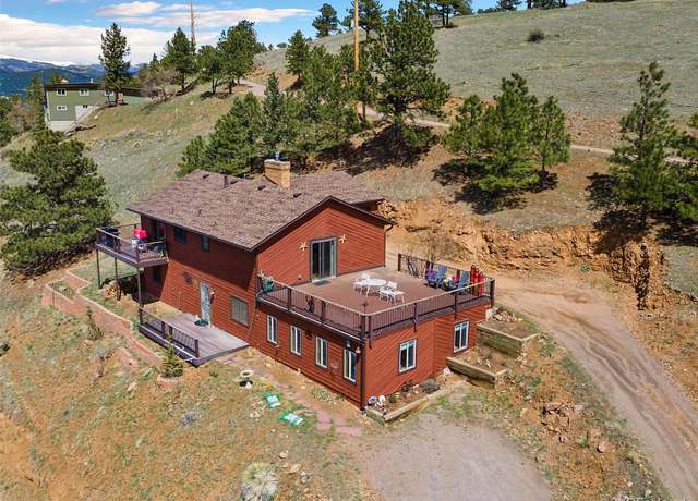 Property at 24170 Matterhorn Dr, Indian Hills, CO 80454, 4 beds, 2 baths
