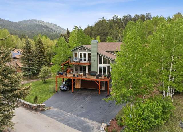 Property at 4230 S Meadow Brook Ln, Evergreen, CO 80439, 4 beds, 4 baths