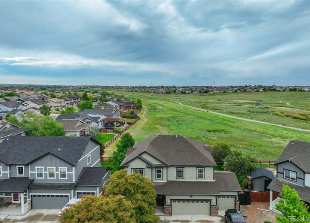Property at 16747 E 97th Pl, Commerce City, CO 80022, 5 beds, 4 baths