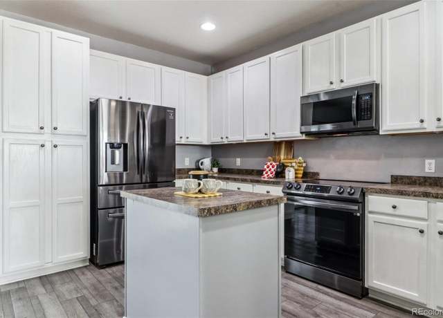 Property at 15612 E 96th Way Unit 13E, Commerce City, CO 80022, 3 beds, 3 baths