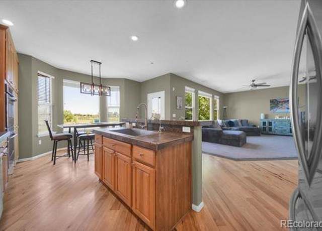Property at 16141 E 119th Ave, Commerce City, CO 80022, 5 beds, 4 baths