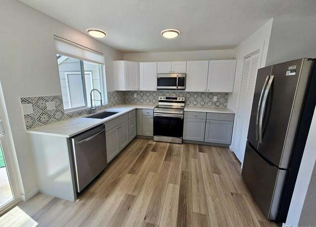 Property at 9613 W Chatfield Ave Unit F, Littleton, CO 80128, 2 beds, 3 baths