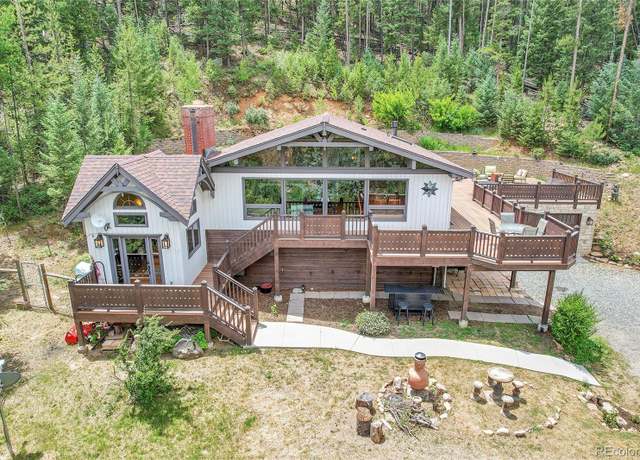Property at 1774 Upper Bear Creek Rd, Evergreen, CO 80439, 4 beds, 3 baths