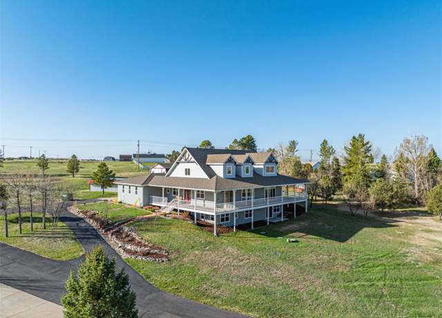 Property at 8256 S Ireland Way, Aurora, CO 80016, 4 beds, 4 baths
