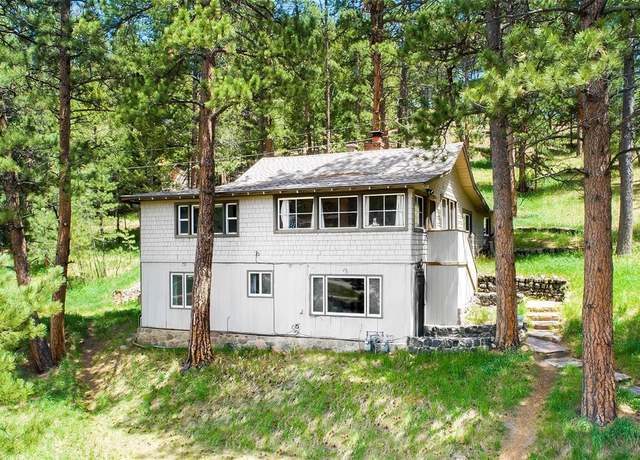 Property at 28958 Buffalo Park Rd, Evergreen, CO 80439, 4 beds, 2 baths