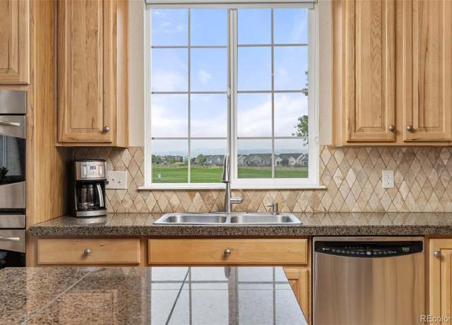 Property at 16120 E 119th Ave, Commerce City, CO 80022, 5 beds, 4 baths