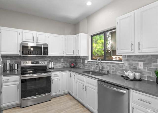 Property at 10693 W 63rd Dr #106, Arvada, CO 80004, 3 beds, 2 baths