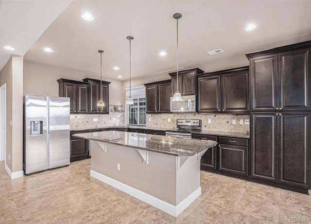 Property at 5521 Ensenada St, Denver, CO 80249, 2 beds, 2 baths