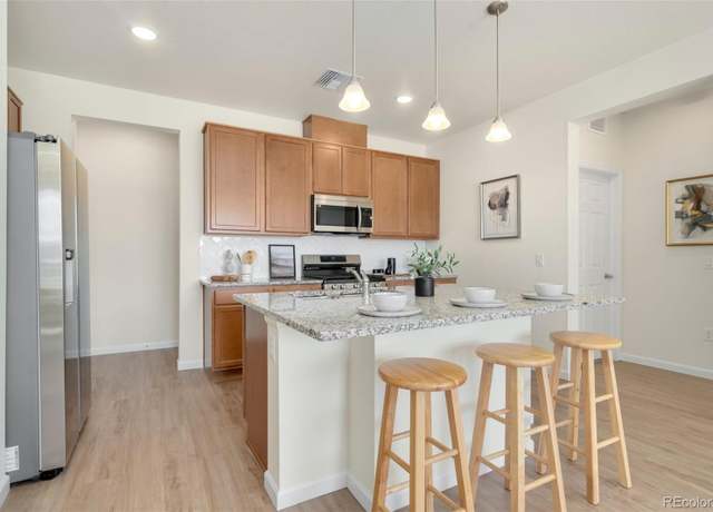 Property at 6153 N Ceylon St #203, Denver, CO 80249, 3 beds, 2 baths