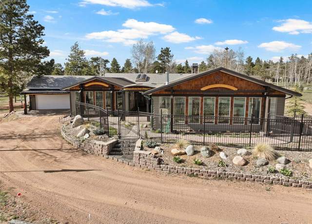 Property at 100 Kinnikinnik Dr, Woodland Park, CO 80863, 5 beds, 5 baths