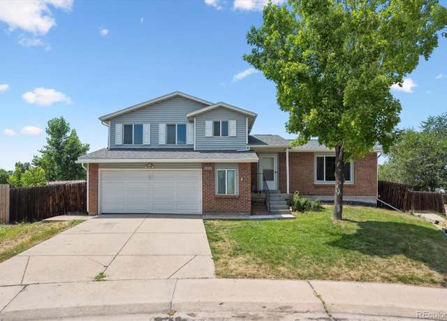 Property at 9975 W Wagon Trail Dr, Littleton, CO 80123, 4 beds, 4 baths