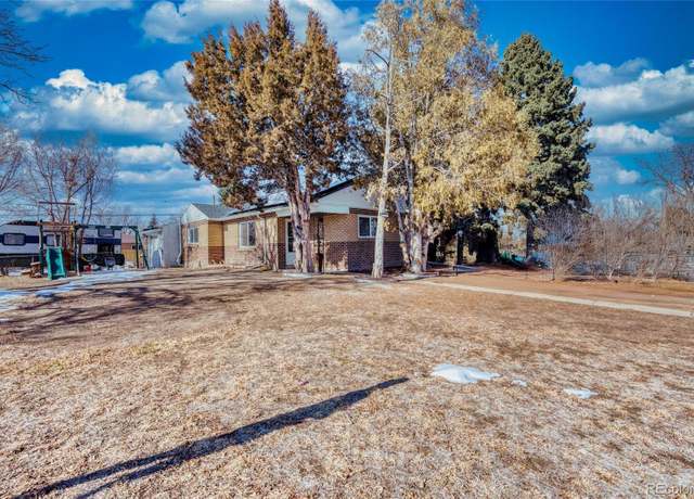 Property at 6825 E Martin Luther King Jr Blvd, Denver, CO 80207, 4 beds, 2 baths