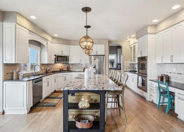 Property at 8131 S Coolidge Way, Aurora, CO 80016, 4 beds, 5 baths