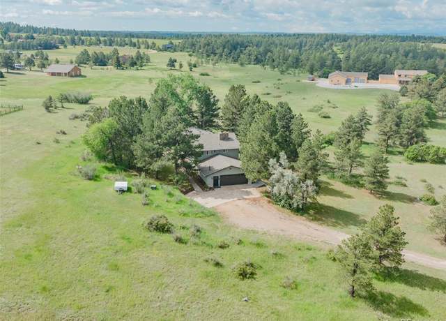 Property at 9212 Tanglewood Rd, Franktown, CO 80116, 5 beds, 3 baths