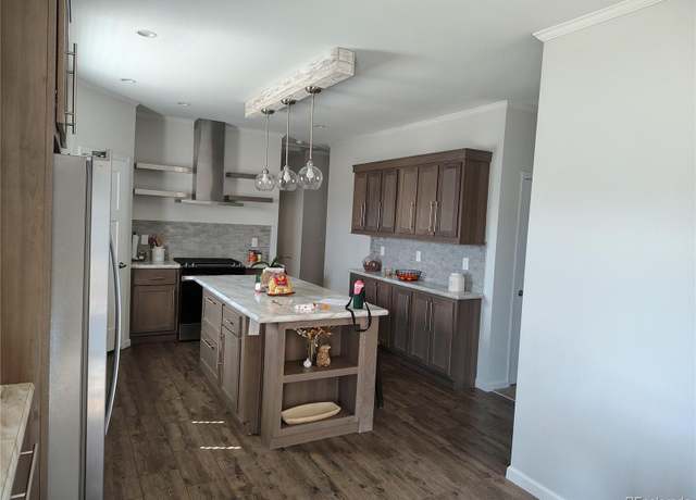 Property at 15460 Casler Ave, Fort Lupton, CO 80136, 4 beds, 4 baths