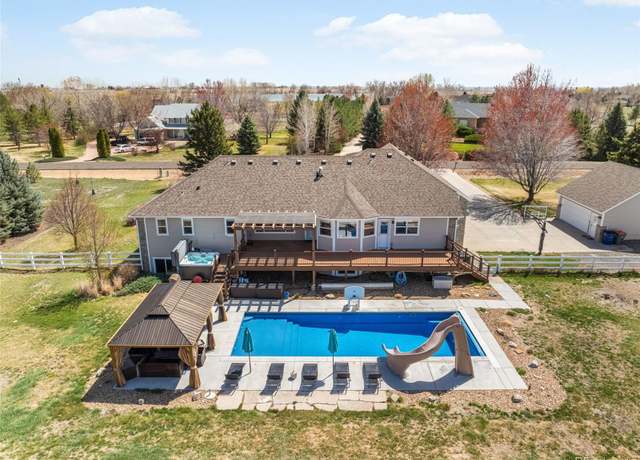 Property at 212 Mulligan Lake Dr, Mead, CO 80542, 7 beds, 4 baths