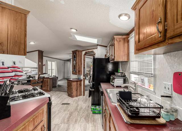 Property at 6705 S Santa Fe Dr, Littleton, CO 80120, 3 beds, 2 baths