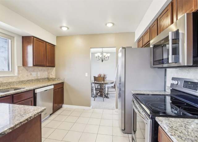 Property at 12097 E Mexico Ave, Aurora, CO 80012, 5 beds, 3 baths