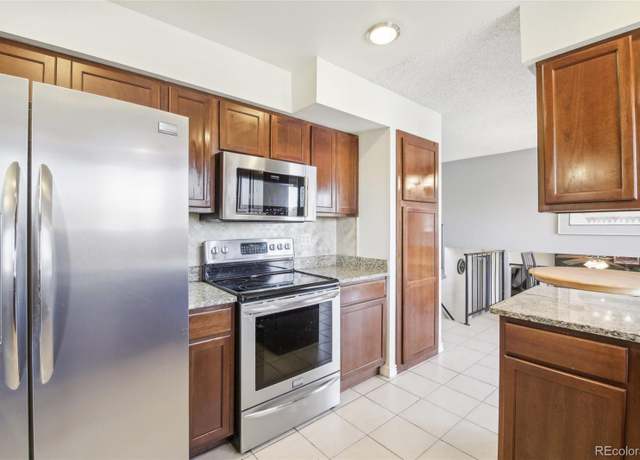 Property at 12097 E Mexico Ave, Aurora, CO 80012, 5 beds, 3 baths