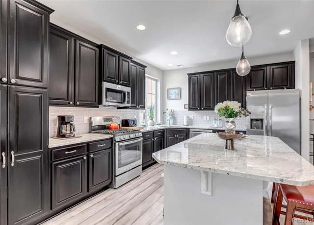 Property at 5519 Genoa St, Denver, CO 80249, 3 beds, 3 baths